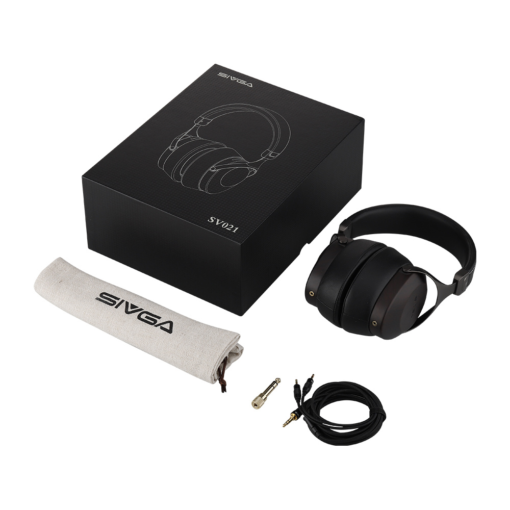 Hörlurar med tillbehör och en svart förpackning.