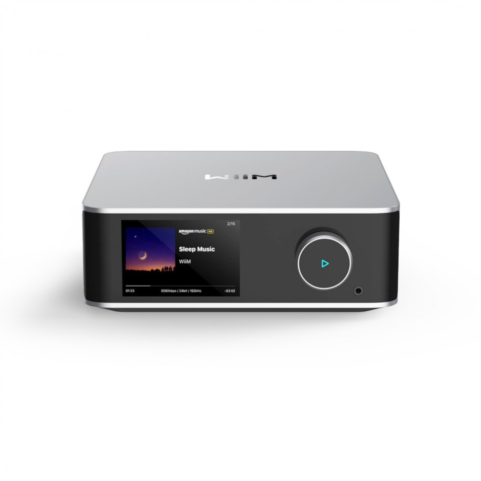 En silverfärgad nätverksspelare med pekskärm och kontroller.