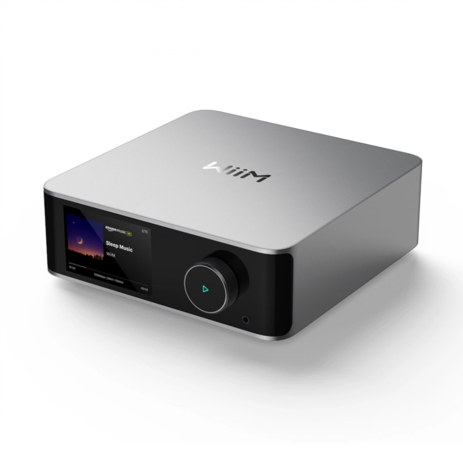 En silverfärgad nätverksspelare med pekskärm och volymkontroll.