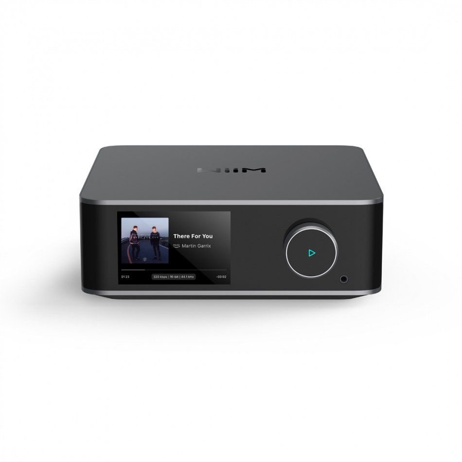 Nätverksspelare med HDMI ARC, pekskärm och kontrollknapp, mörkgrå färg.