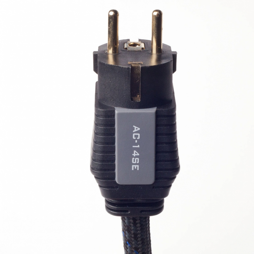 Strömkontakt med två stift och tät kabelförbindelse.