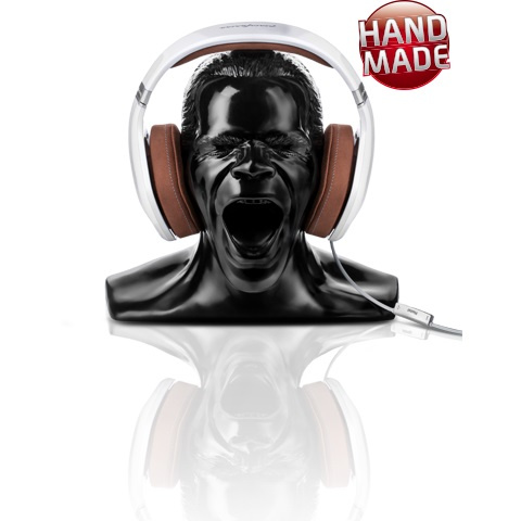 Hörlursställ i form av en skulptur med en screamande ansiktsdesign.