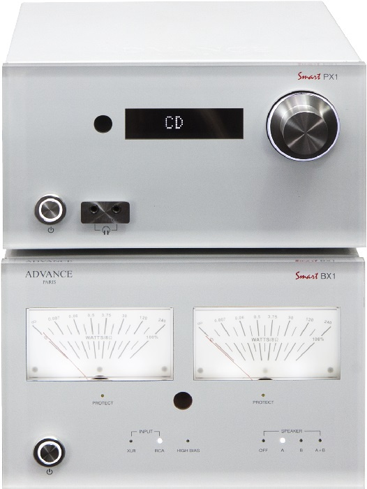 En silverfärgad midi-förstärkare med volymkontroll och mätartavlor.