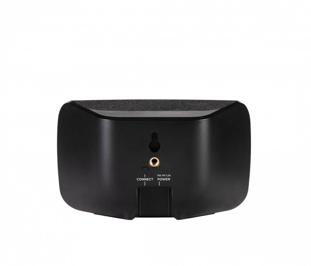 Trådlös surroundhögtalare med anslutningar för ström och ljud.