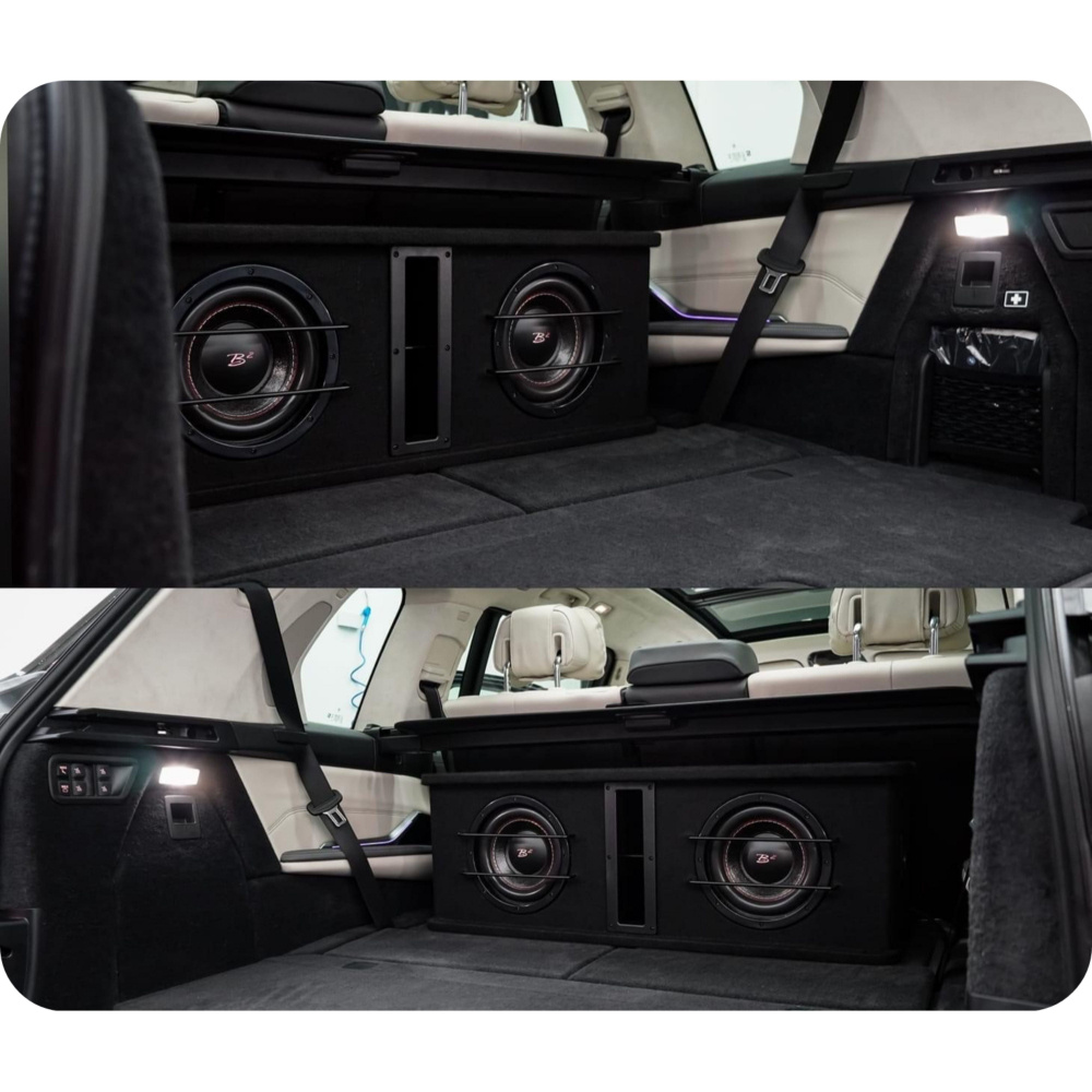 Bilde visar en tvåkanals baslåda med två 8-tums woofer i bilens bagageutrymme.