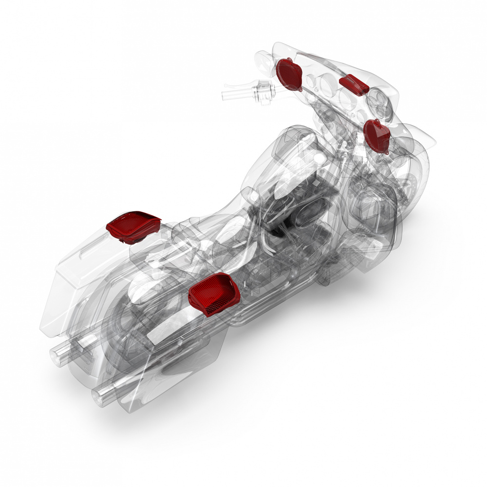 En genomskinlig modell av en motorcykel med ljudsystemskomponenter.