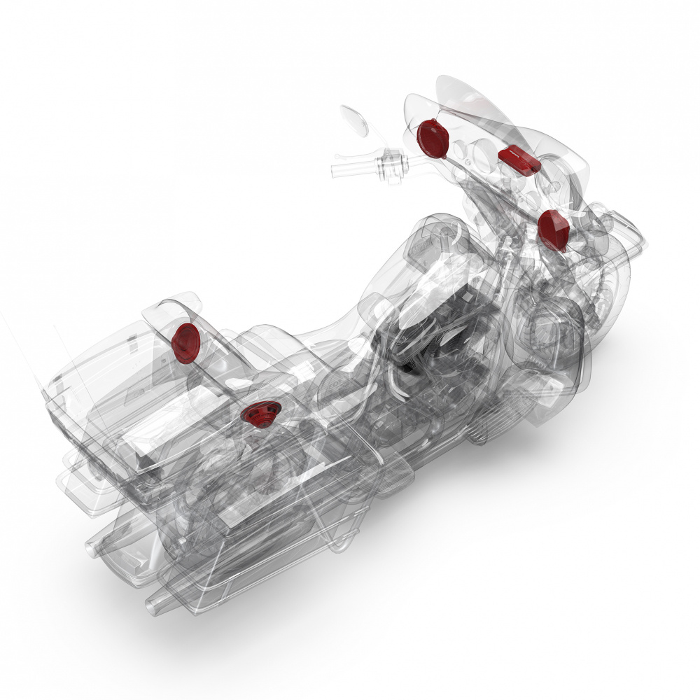 Bild av motorcykel med synliga ljudsystem och högtalare.