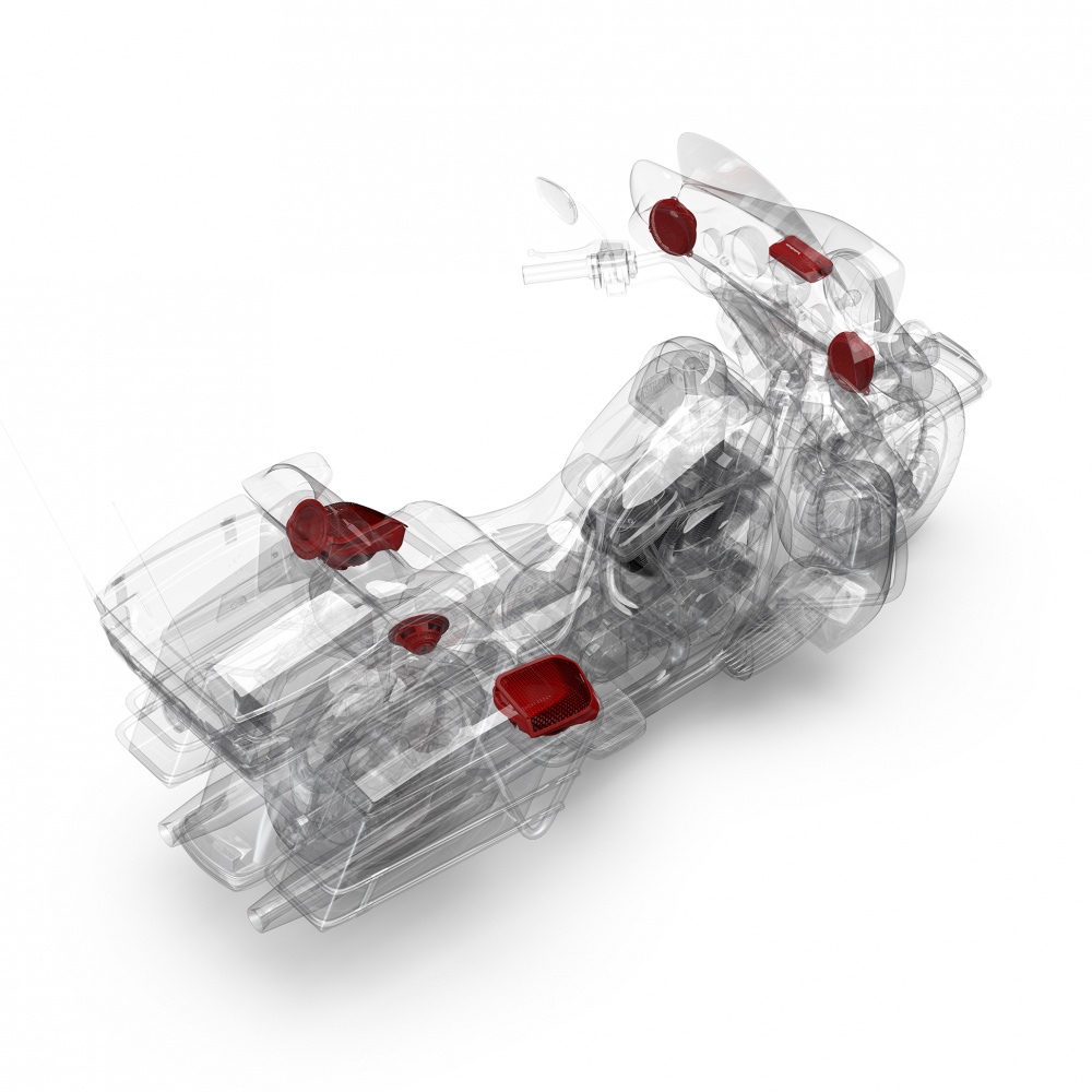 En genomskinlig illustration av en motorcykel med högtalare.