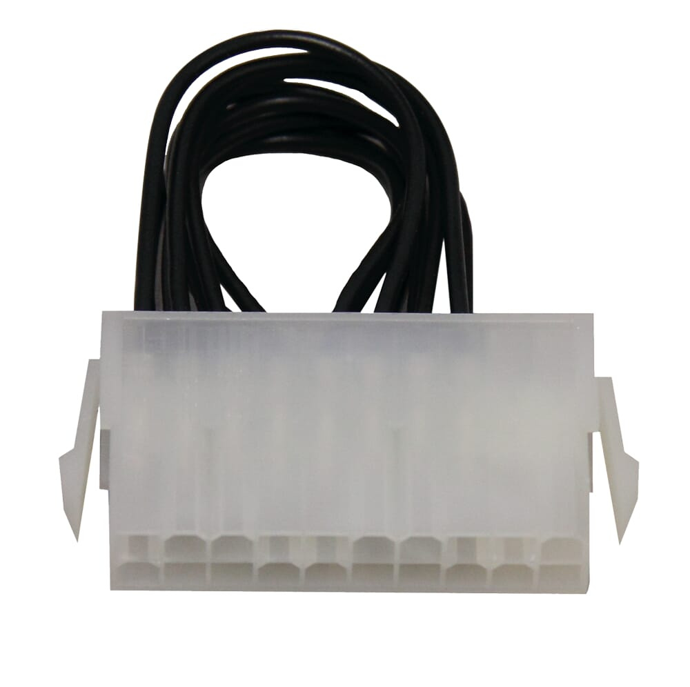 En vit kontakt med svarta ledningar, troligtvis för elektrisk anslutning.