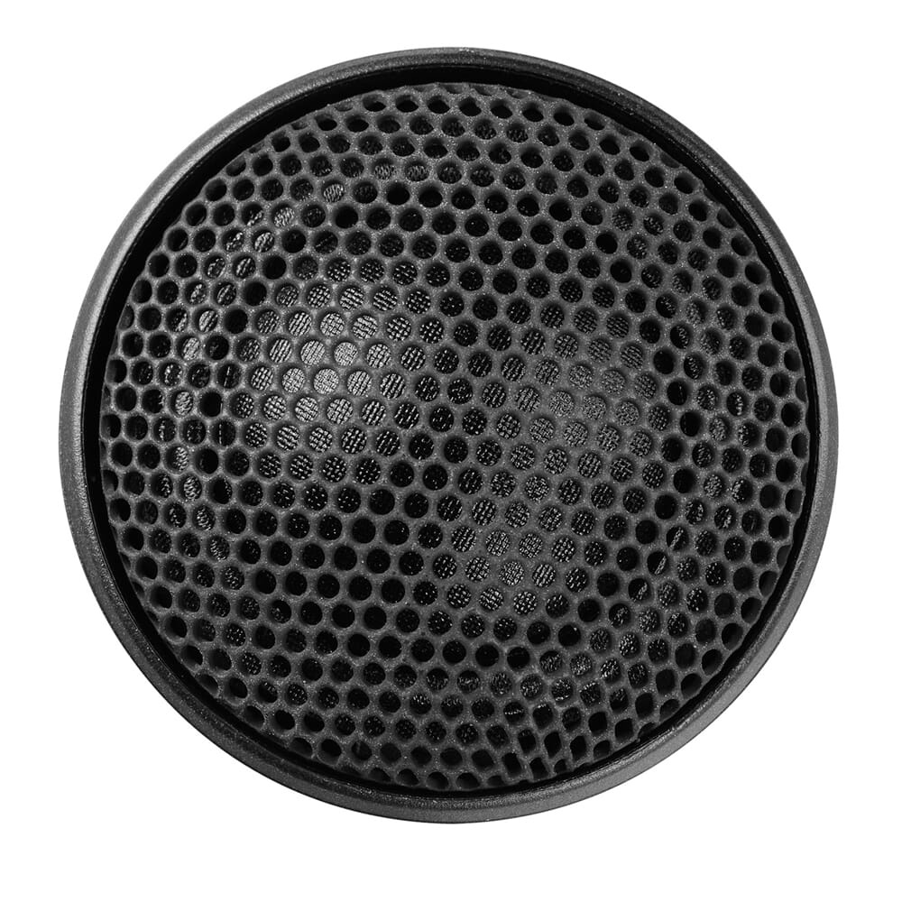 Svart högtalargaller med mönster av små hål.