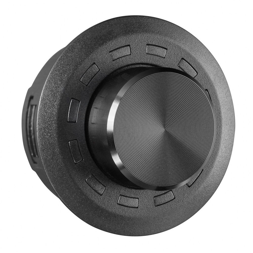 Svart kontrollknapp med mönstrad yta och cirkulära markeringslinjer.