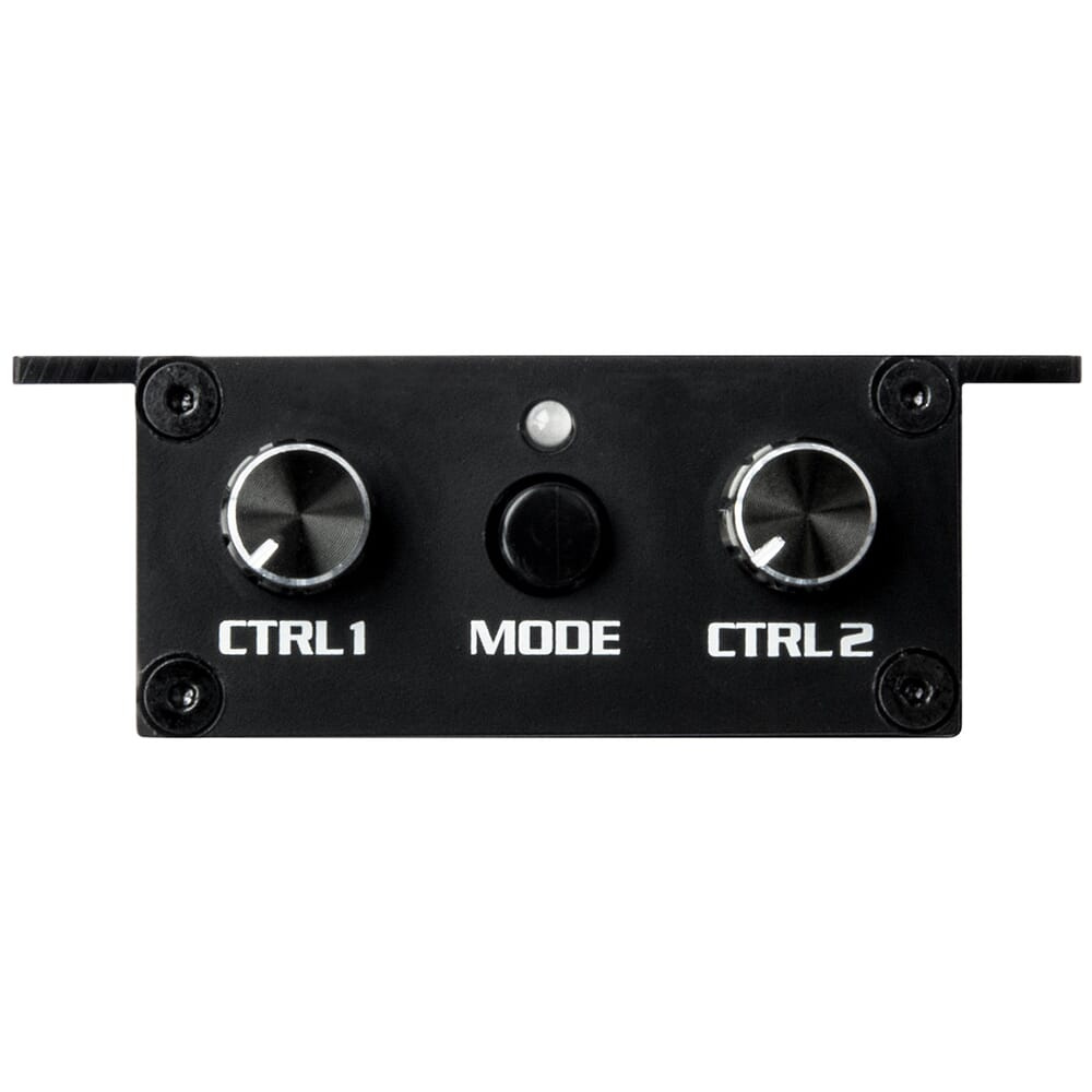 Fjärrkontroll med två rattar och en knapp för lägesval.