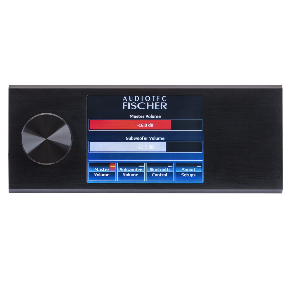 En fjärrkontroll med knapp och display för volymkontroll och inställningar.