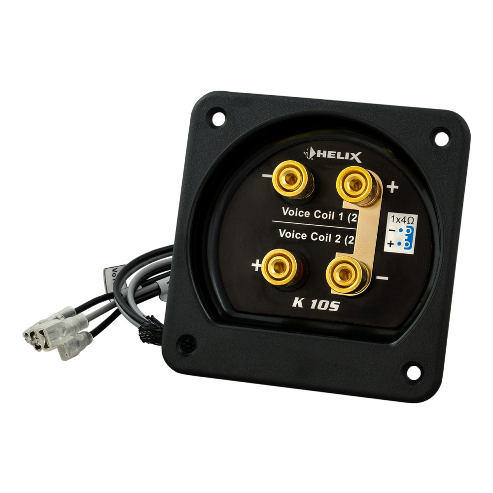 En svart baschassi med anslutningar för röstspolar.