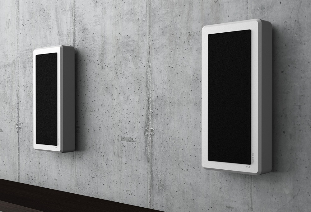 Väggmonterade högtalare med matt yta och svart front.