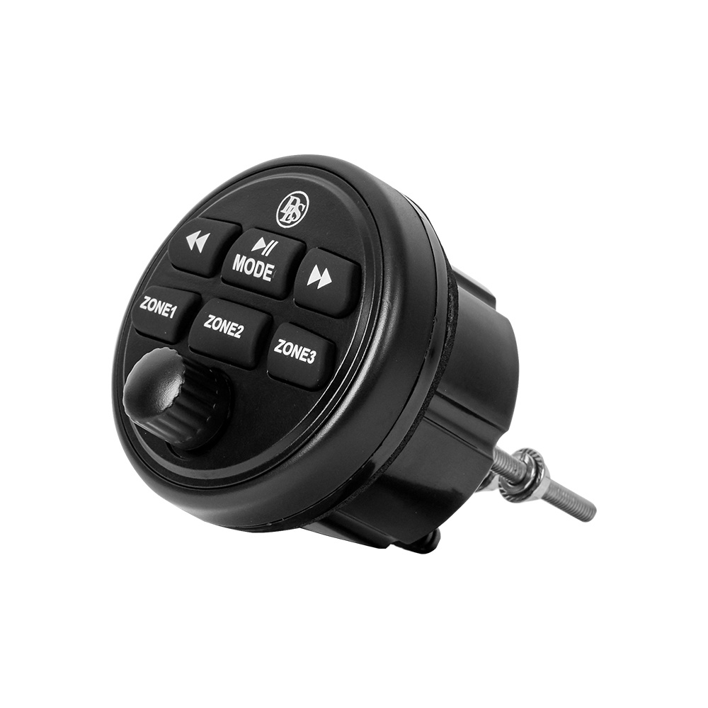 Fjärrkontroll med knappar för zoner och ljudkontroll.