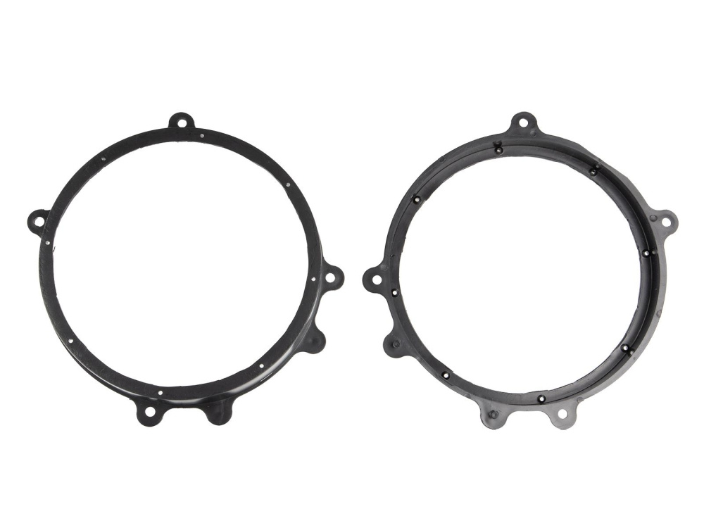 Två svarta högtalaradaptrar för Tesla Model 3/Y.