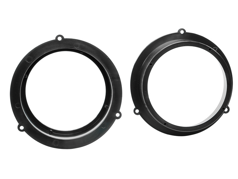 Högtalaradapter för Audi med rund form, två stycken i svart plast.