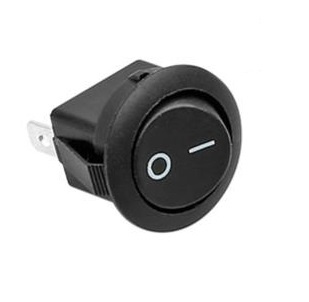 Strömbrytare med svart rund knapp och två anslutningar för installation.