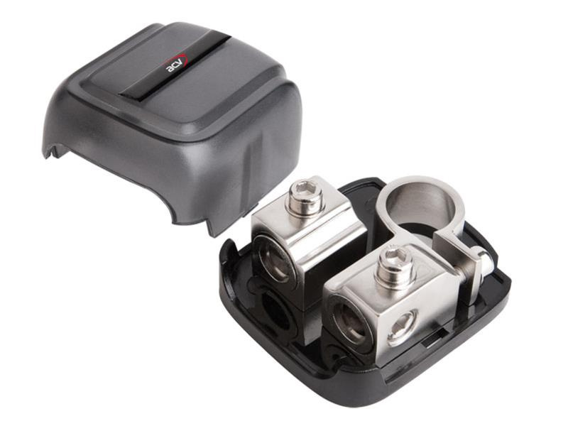 Batterikontakt med plastlock och metallpoler för elanslutning.