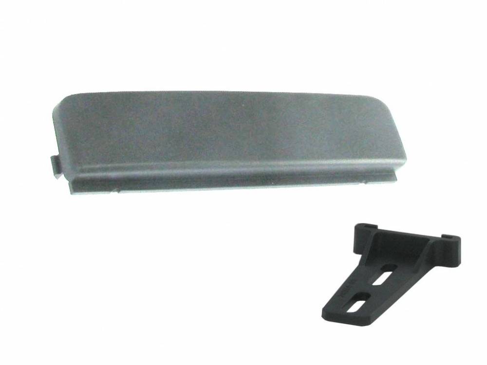 Monteringskit för eftermarknads-stereo, inklusive fäste och platta.