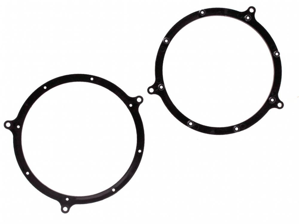 Två svarta högtalaradaptrar för Audi-modeller.