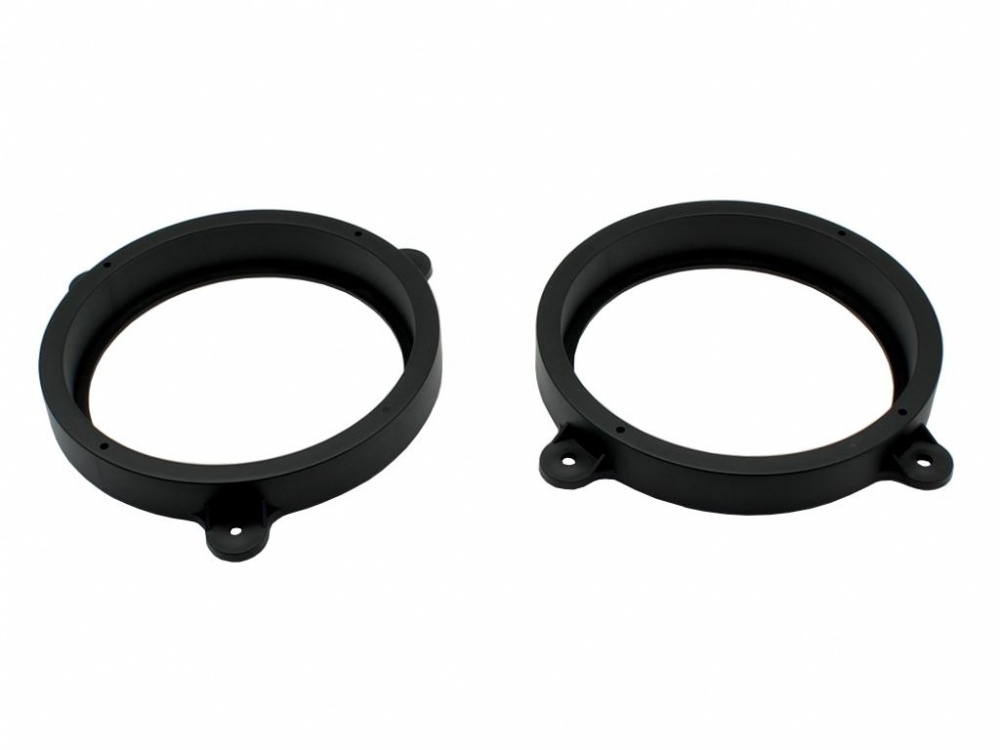 Två svarta högtalaradaptorer för Subaru-bilar.