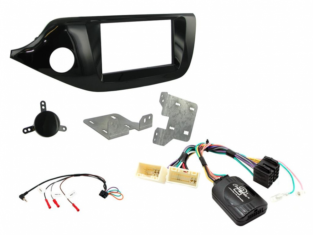 Installationskit för Kia Cee'd, innehållande olika delar för bilstereo.