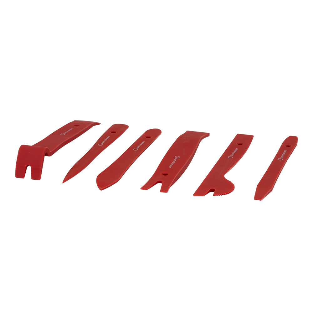 Set av sex röda plastverktyg för demontering.