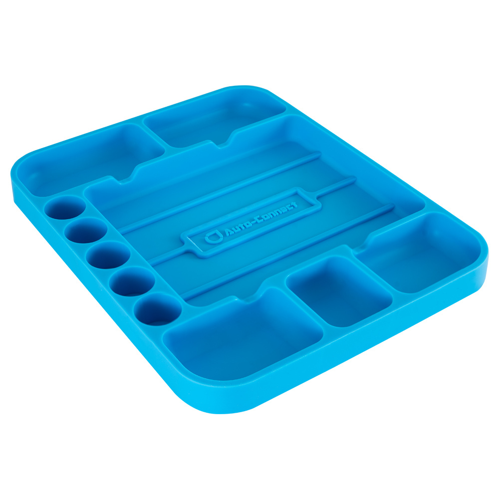 Blå silikonbricka med fack för skruvar och verktyg.
