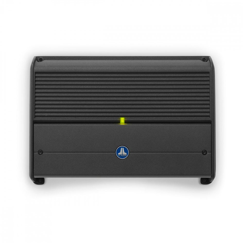 En svart, fyrkantig förstärka med ribbad yta och en ljusindikator.