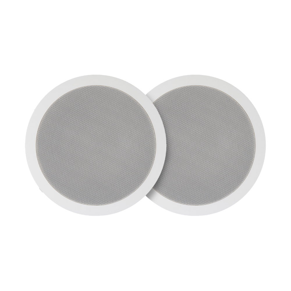 Högtalarpar med rund vit design och grå nätfront.