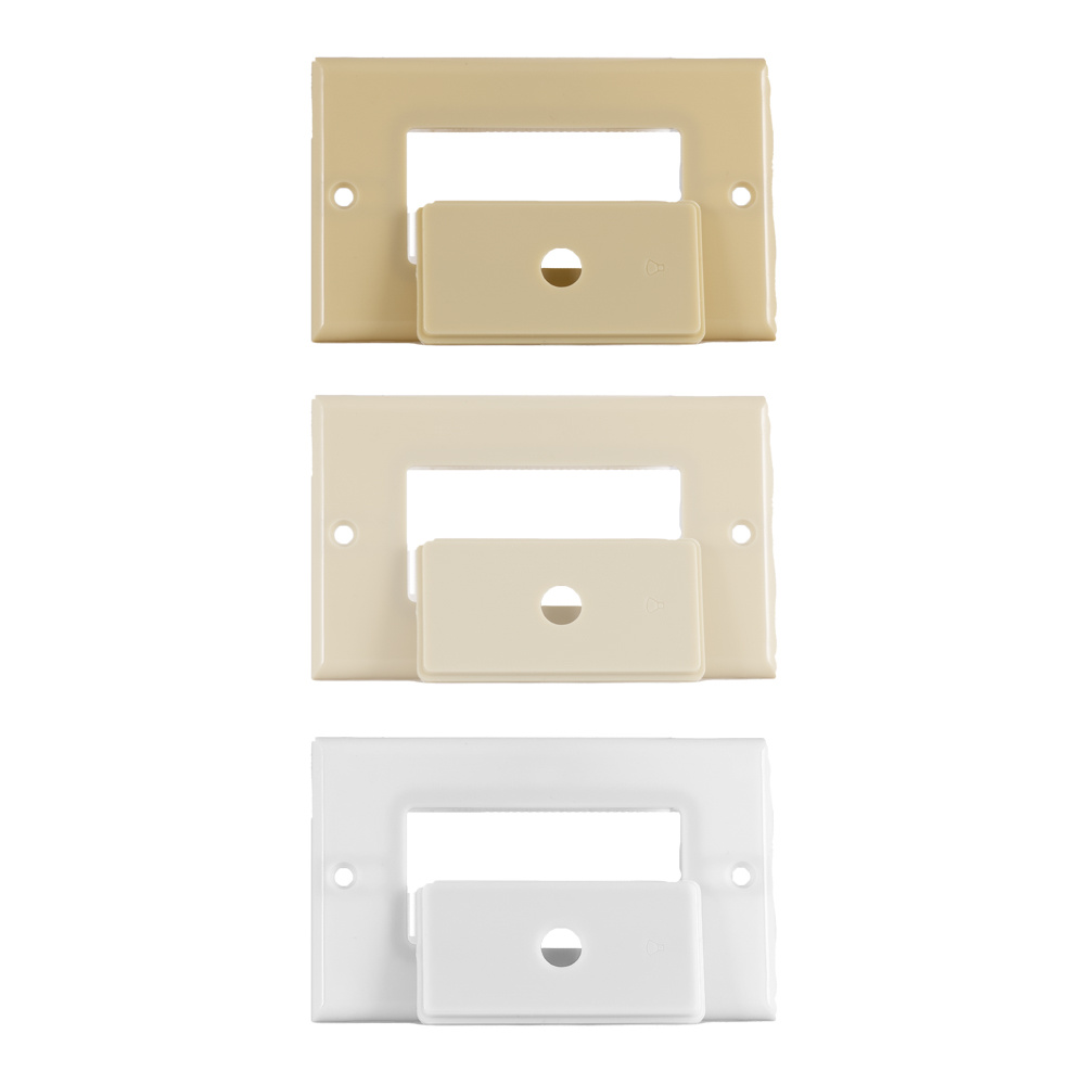 Tre volymkontroller i beige och vit plast.