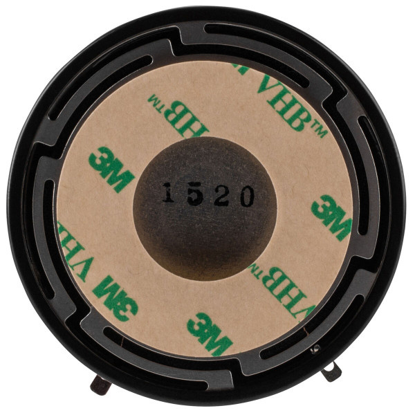 En exciter med rund form och svart yta, designad för ljudåtergivning.