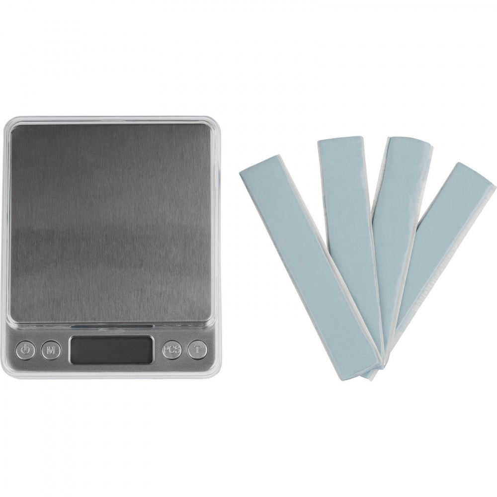 Digital våg med vikter för DATS-användning.