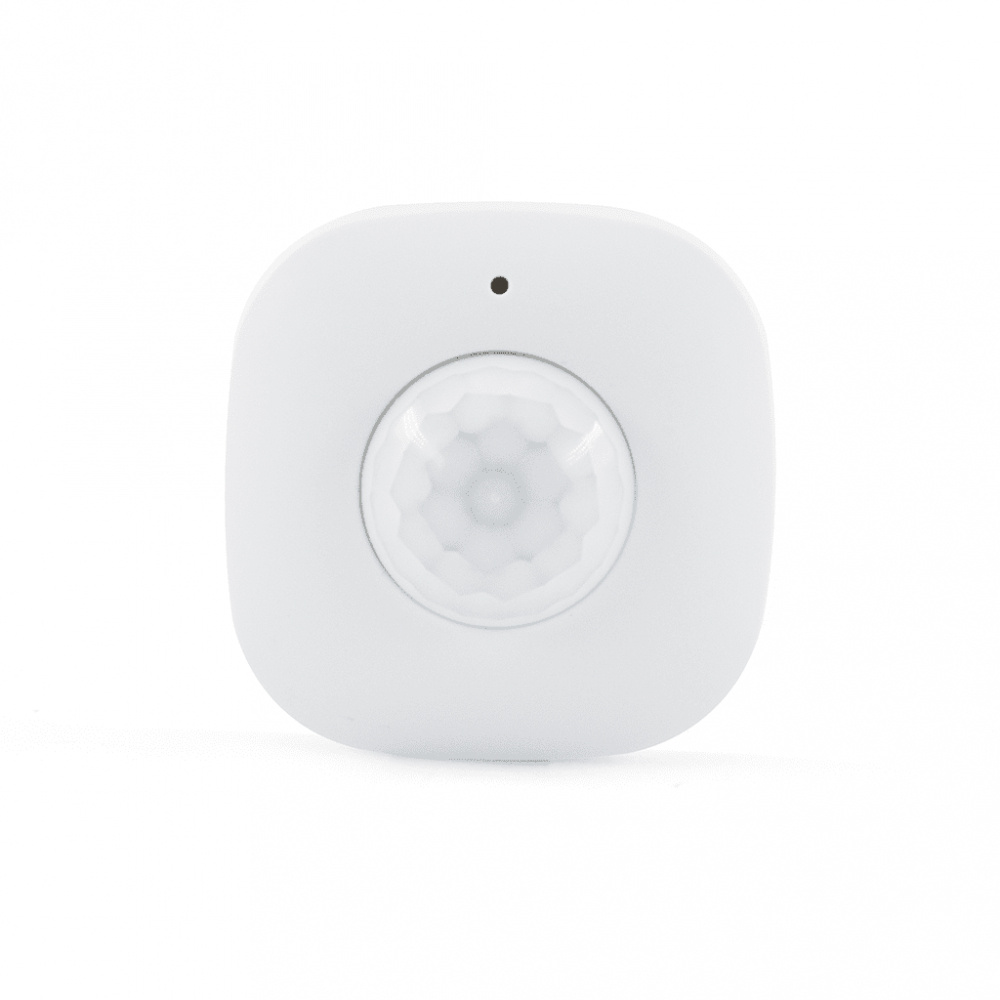 En vit rörelsesensor med en rund sensor i mitten.