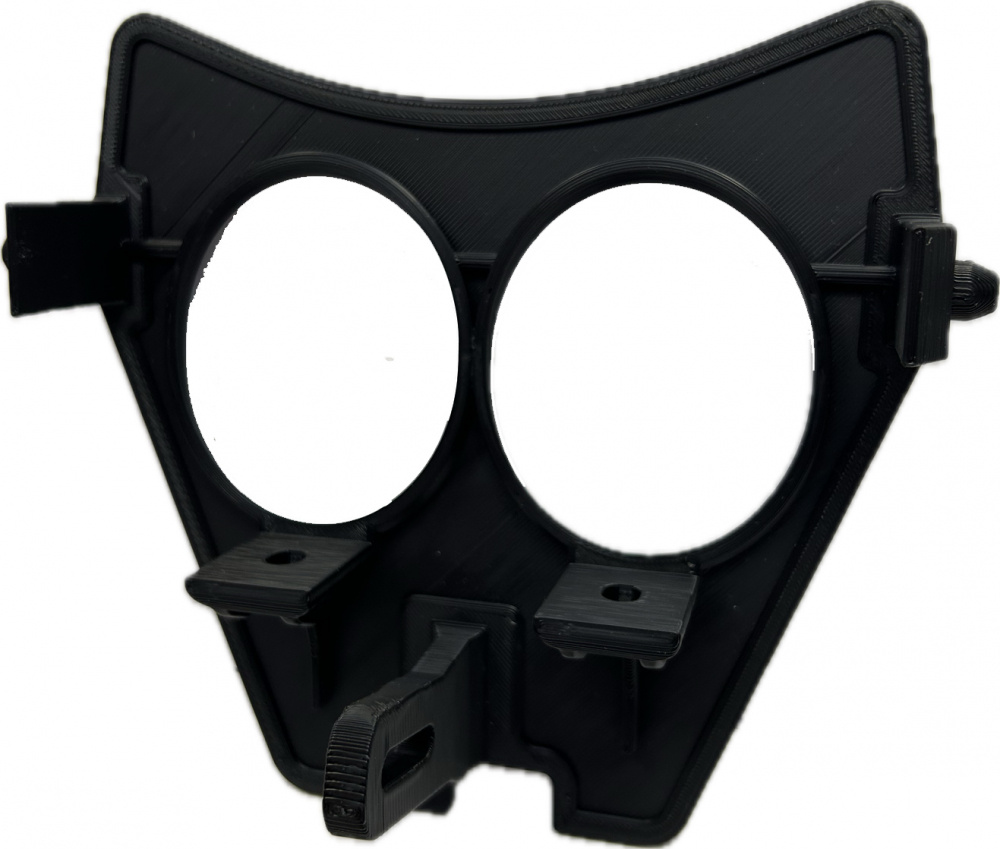 Lampfäste i svart plast med två runda hål för lampor.