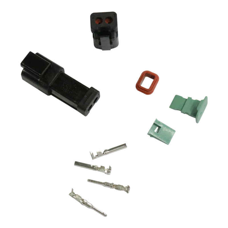 Kopplingsdela med kontakter, stoppningsdelar och metalliska anslutningar.