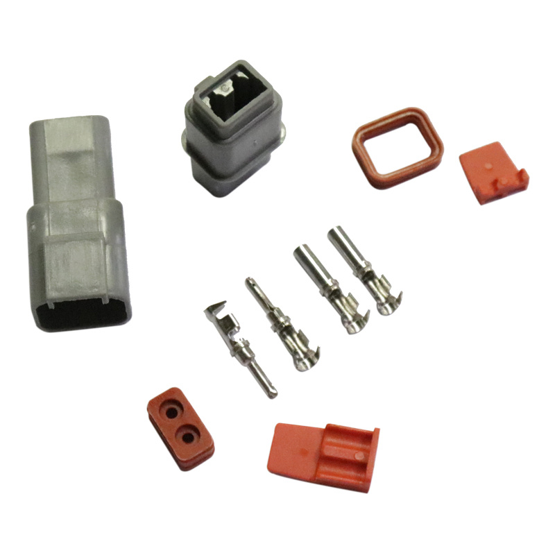 Kopplingsdelar för DTP kontakt, innehållande hölje och kontakter.