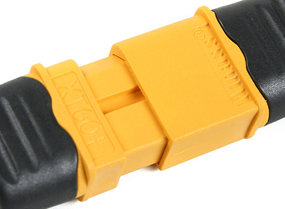 En gul kabelkontakt med gummihandtag för crosshoj.