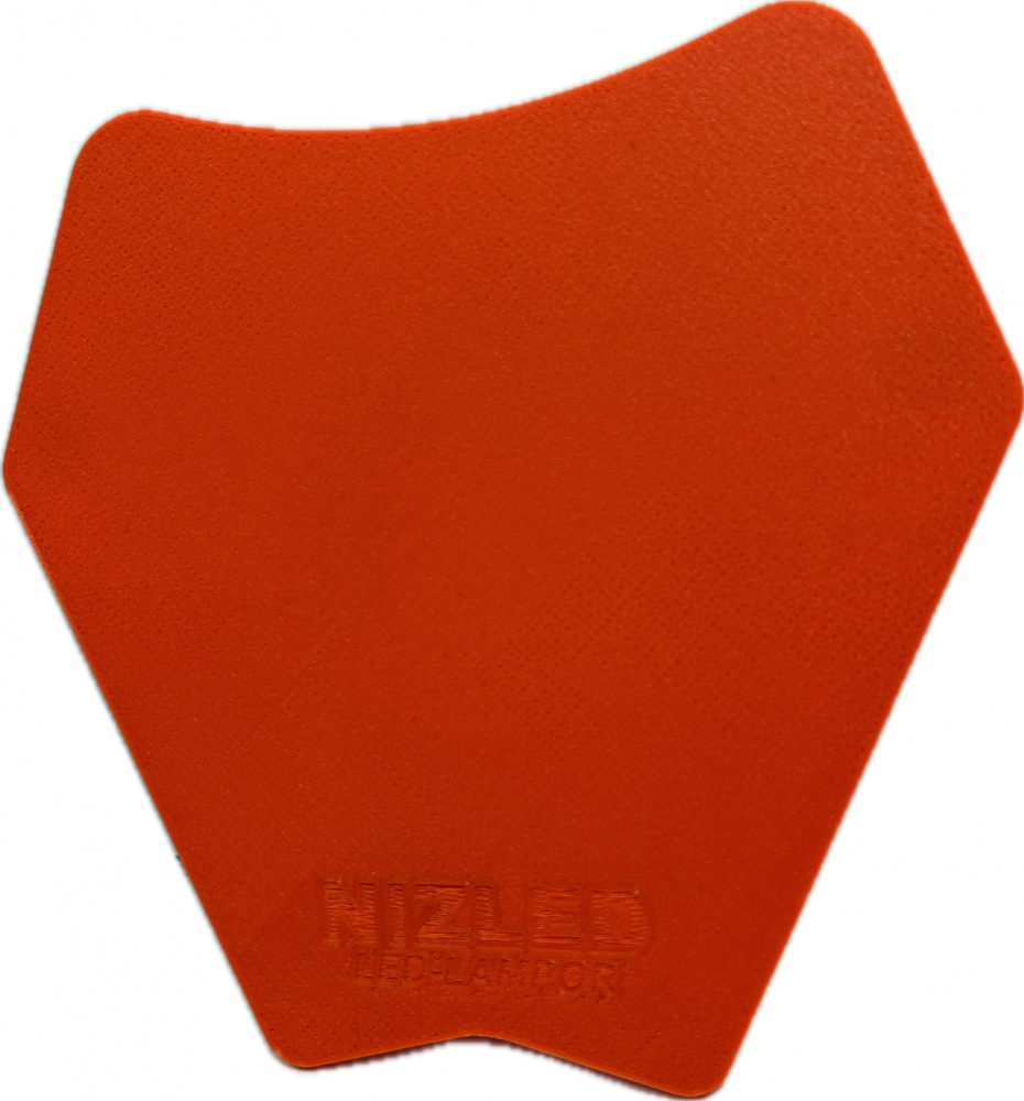 Skyddsplåt i orange plastform för lamphus, designad för KTM 2024.