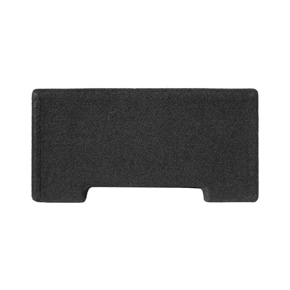 En svart nedåtriktad baslåda med en texturerad yta.