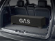 GAS MAX B1-28, riktigt tung 2x8 tum baslåda En svart baslåda från GAS, modell B1-28, placerad i en bils bagageutrymme.