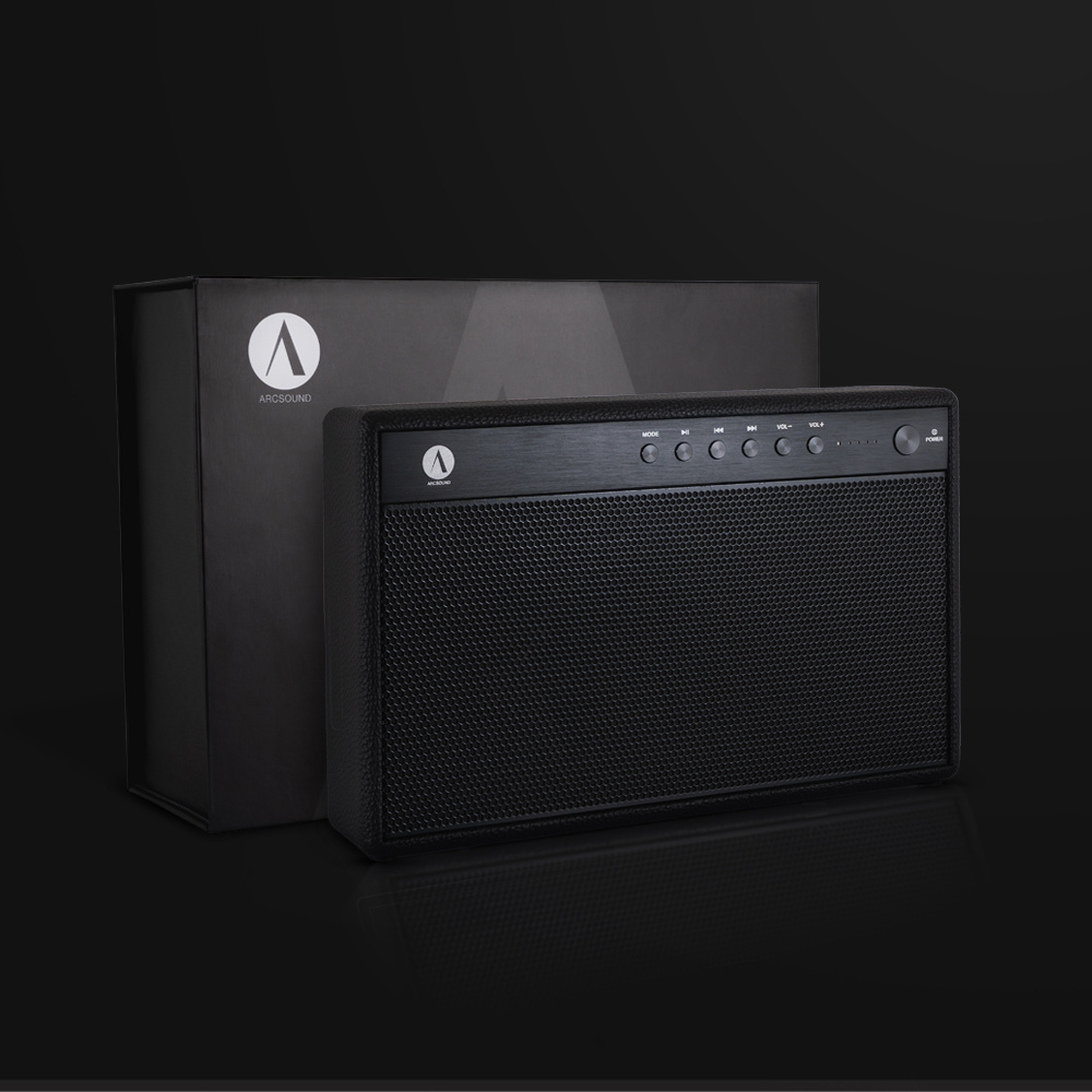 En svart bärbar Bluetooth-högtalare med låda.