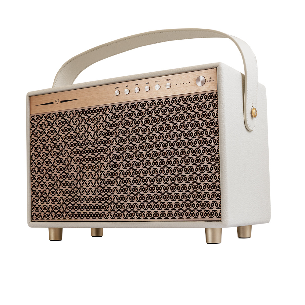 Bluetooth-högtalare i vitt med trädetaljer och bärhandtag.