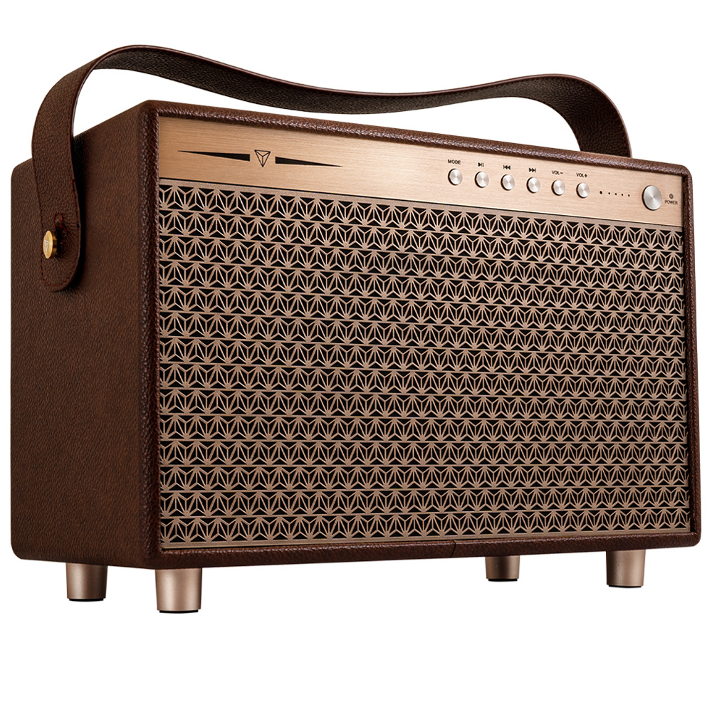 Bluetooth-högtalare i retrodesign med läderlook och kontroller på framsidan.