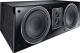 Magnat Signature Center, svart En svart högtalare med två stora basar och en diskant.