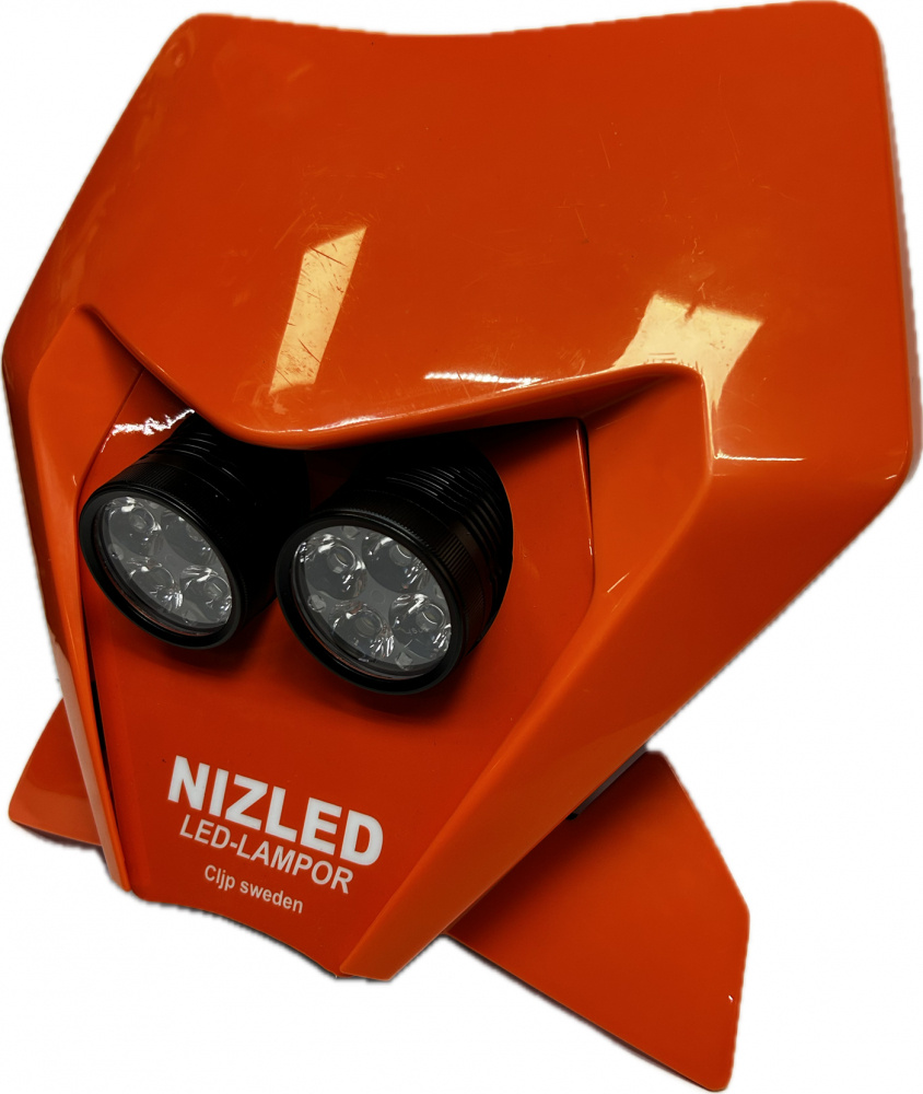 Lampkåpa i orange med två R40DRL LED-lampor för KTM-motorcyklar.