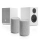 Audio Pro A28-paket, medium Högtalarpaket med två små och en större enhet i vit och grå design.