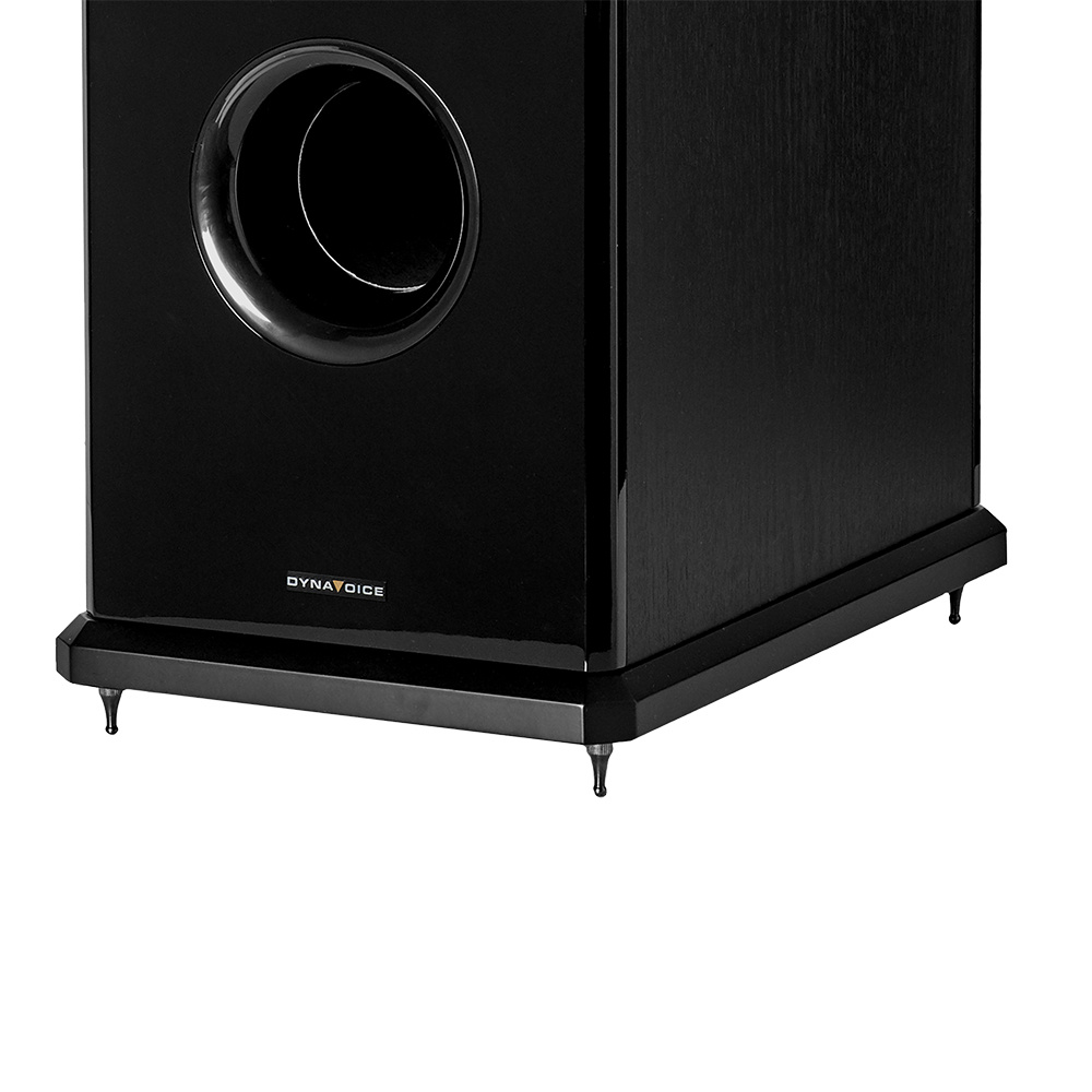 Svart subwoofer med elegant design och nedåtriktad basport.